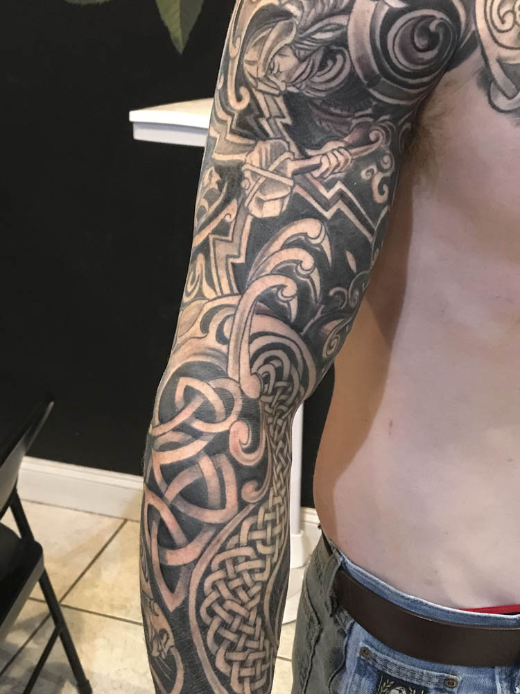 To represent John's family heritage. Nordic and Celtic inspired half  sleeve. Adding to his Filipino tribal forearm, done by… | Instagram